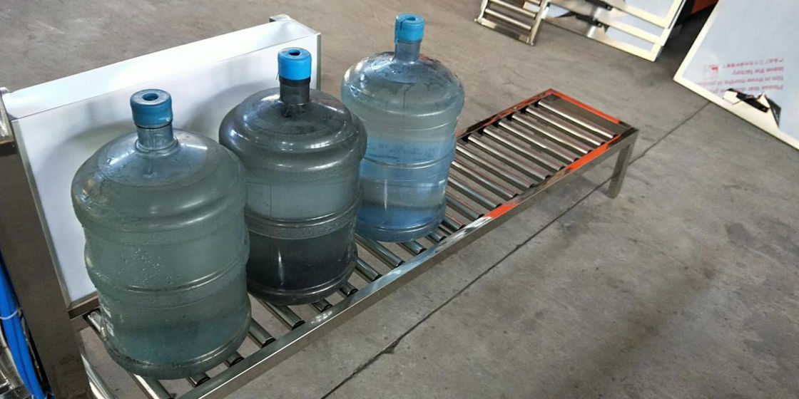 Roller Conveyor Galon Water Plant Habis Untuk Lini Produksi Botol Galon pemasok